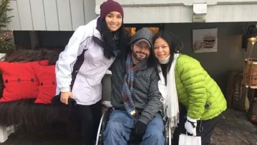 a group of people posing for the camera