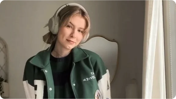 a person wearing a green jacket